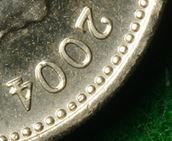 One-Pound-Coins-2004-Edge-Error.